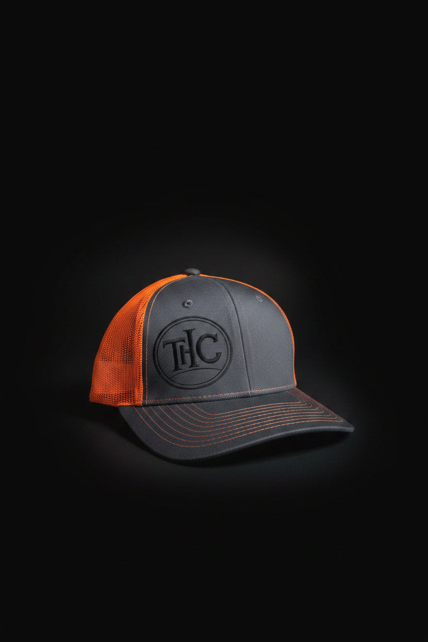 THC Logo Trucker Hat — Charcoal & Neon Orange